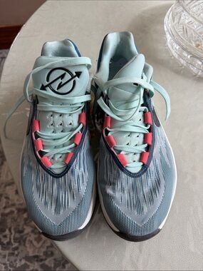 Nike mens Light Teal Sneakers with Coral Accents